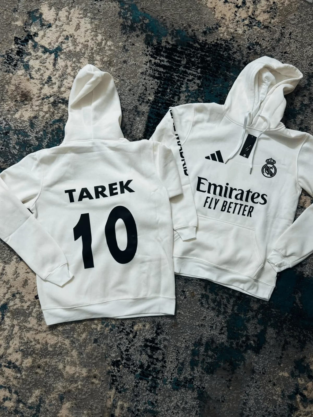 هودي ريال مدريد مع كتابة على الايد